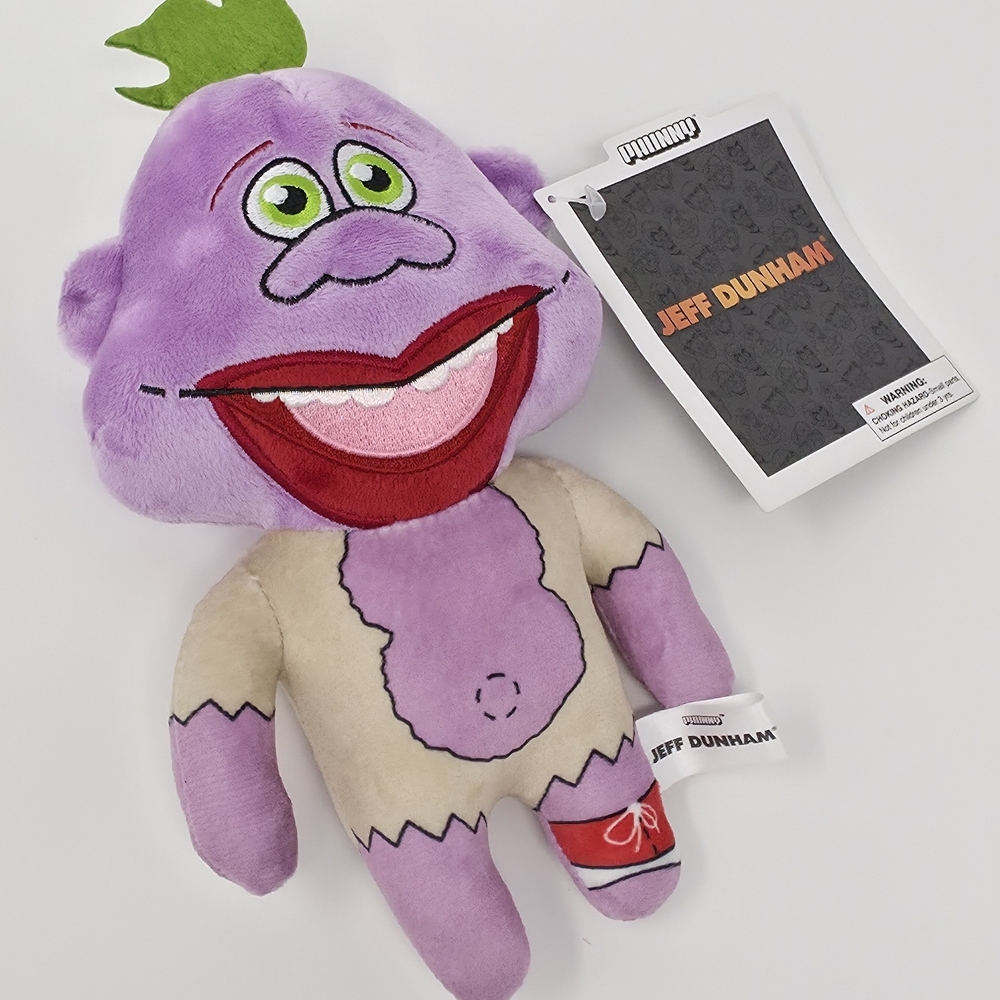 Dunham Purple and Tan Plush Toy